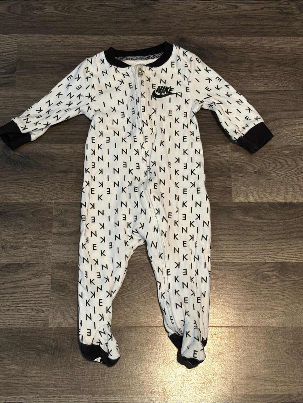 Nike White Footed One-Piece with Black Logo and Trim